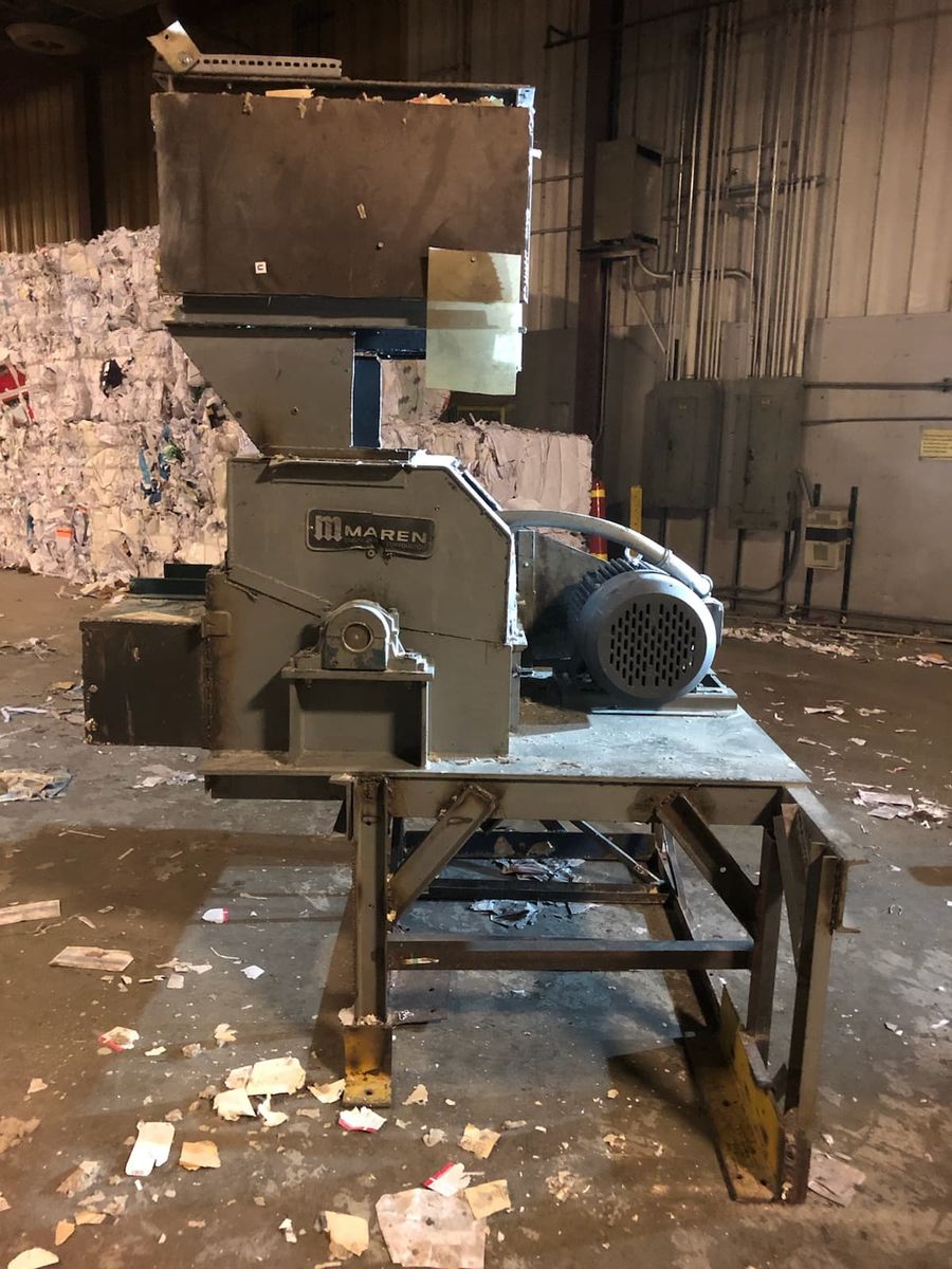 Book processing equipment on a warehouse floor